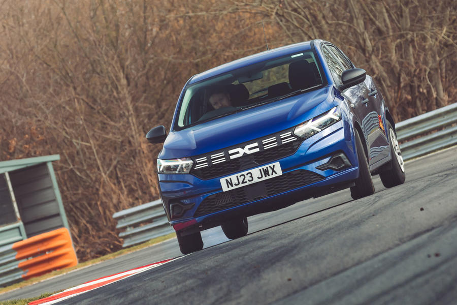 Blue 2023 Dacia Sandero front cornering